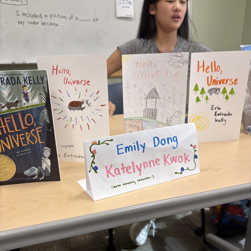 Kids' hand-drawn redesigns of the Hello, Universe book cover